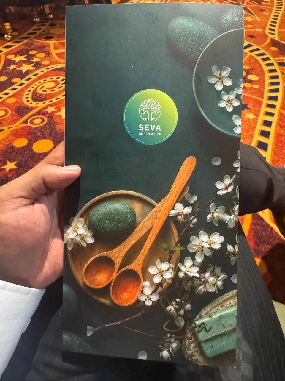 SEVA Onsen and Spa 이름이 적힌 현장 안내책자 표지